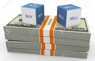 10402679-3d-box-of-text-buy-and-sell-on-top-of-dollar-s-stacks-Stock-Photo